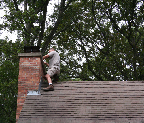 Brad Installing a Chimney Cap